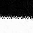 Load image into Gallery viewer, The close-up shot of Morgan & Tina's black and white luxury bath towel.