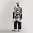 Load image into Gallery viewer, A model showcasing the back design of World Tree black silk women's pajama set by Morgan & Tina.