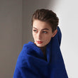Load image into Gallery viewer, The close-up image of a beautiful model with Morgan & Tina's luxurious bath towel.